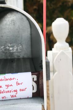 a mailbox with a message written on it