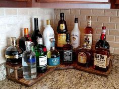 there are many liquor bottles on the counter