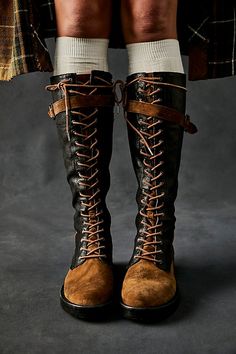 Taking cues from utilitarian style, these lace-up knee-high boots are the coolest of cool, perfect for adding a rugged detail to any look. **Features:** Tall design, combat style, mixed leather and suede uppers, lace-up closure, inner zipper, rounded toe, slight heel, buckle detail, pull tab **Why We | We the Free Bowden Lace Up Boots at Free People in Brown, Size: EU 38 Cordoba, Couture, Brown Knee High Combat Boots, Knee High Wide Calf Boots, Big Winter Boots, Modern Steampunk Outfits, Black Vintage Boots, Greek Boots, Combat Boots And Shorts