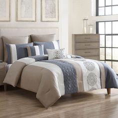 the comforter is neatly made and ready to be used in the bedroom or living room