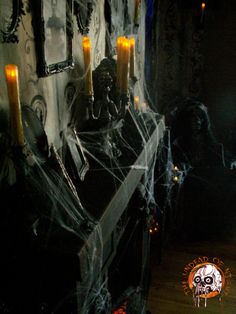 a halloween scene with candles and decorations