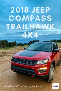 the jeep compass trailhawk 4x4 is parked in front of a dirt road