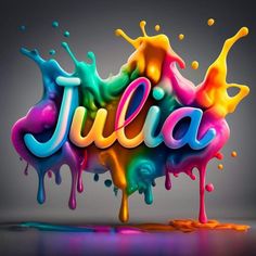 the word julia painted in multicolors and splashing on it's surface