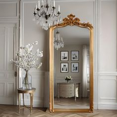 Explore timeless elegance with our Jardinière floor mirror, perfect for your living room, bathroom, or bedroom. This 6.5-foot gilt gold mirror, inspired by Rococo style, exudes French sophistication. Hand-carved with intricate detail, its antique reproduction adds historic elegance to any space. Ideal for grand foyers, luxurious living rooms, or elegant bedrooms, this mirror becomes a captivating focal point. PRODUCT DETAILS ------------------------ ✔ Dimensions: 79 inches (H) x 35 inches (W) ✔ Antique Body Mirror, Gold Floor Length Mirror Bedroom, Gold Full Length Mirror Bedroom, Anthropology Floor Mirror, Styling Floor Mirror, French Interior Bathroom, Antique Mirror Living Room, Big Gold Mirror, Wall Mirrors Decor Ideas