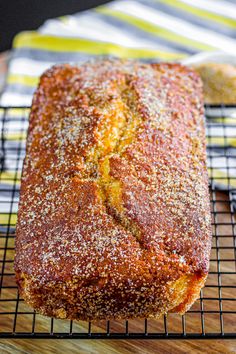 a loaf of bread sitting on top of a cooling rack