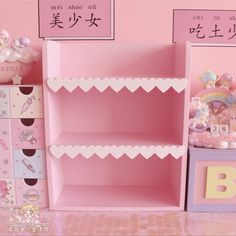 there is a pink shelf in the room