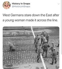 some soldiers are standing around on the ground
