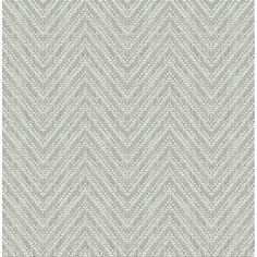 a grey and white chevroned wallpaper pattern