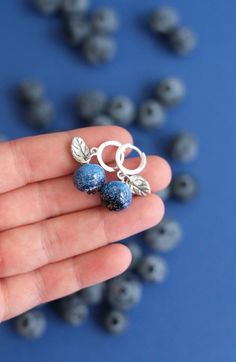 Earrings are very delicate, lightweight and easy to wear.  Each blueberry is handcrafted of italian glass and proper kiln annealed for strength ✨ Leaves are made of 950 silver clay and also absolutely unique  Clasps are sterling silver Blueberry Jewelry, Blue Clothes Aesthetic, Blueberry Earrings, Earring Small, Blueberry Fruit, Blue Berry, Silver Clay, Fruit Earrings, Jewellery Ideas