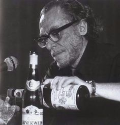 an old man pouring a glass of beer