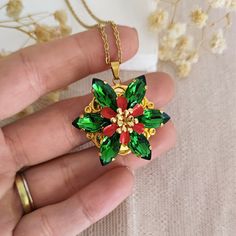 "This Anastasia Necklace is the ideal gift for a fan of the movie or for a Anastasia Romanov's cosplay. It features 16k gold plated brass components and Aurora Fern Green fine crystals. The central flower is hand painted with epoxy enamel. On the back side there's a GLASS disc with the famous quote \"Together In Paris\". Keep away from water. Weight: 18 grams approx. Slide the gallery to see chain options: - type 1: 14k gold filled brass oval chain - type 2: 14k gold filled brass figaro chain - Anastasia Necklace, Dark Academia Jewelry, Together In Paris, Paris Necklace, Locket Earrings, Anastasia Romanov, Cottagecore Jewelry, Customizable Jewelry, Water Weight