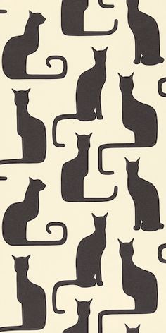 a black and white pattern with cats on it