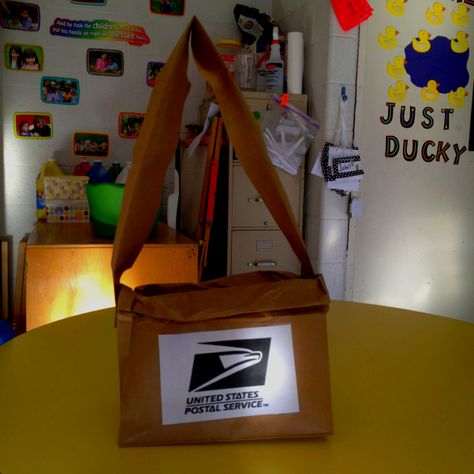 Mail Bag - used for mail week in 3 year old pre-school. Made from grocery bags. Mail Carrier Bag, Valentine Preschool, February Themes, Dramatic Play Themes, Bulletin Board Paper, Community Helpers Preschool, Mail Bag, Office Themes, Community Helper