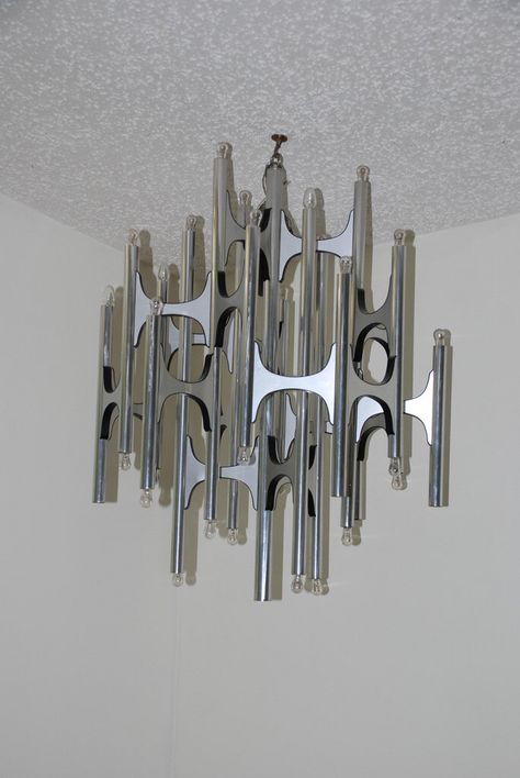 RARE 1970's Gaetano Sciolari Brutalist Chandelier chrome black SCIOLARI LIGHTOLIER Vtg Mid Century Modern Light Fixture Lamp Designer mod by modularparallel on Etsy https://www.etsy.com/listing/214923859/rare-1970s-gaetano-sciolari-brutalist Mid Century Modern Light Fixtures, Modern Light Fixture, Chandelier Chrome, Retail Store Interior Design, Beautiful Home Gardens, Mid Century Modern Lighting, Chrome Chandeliers, Christmas Candle Holders, Silver Chrome