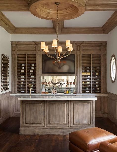 Amazing built in bar boast distressed cabinets under a flatscreen TV niche flanked by built in wine racks. Tv Niche, Bar Lounge Room, Built In Wine Rack, Home Bar Rooms, Media Room Design, Home Bar Design, Built In Bar, Home Bar Designs, Bar Room