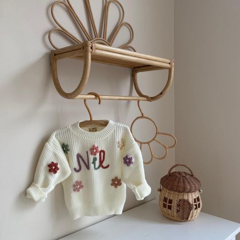 Wrap your little one in love with our hand-embroidered, personalized knitted baby sweater! 🧶✨ Each custom name design is crafted with care for a special touch of warmth. Soft, durable, and perfect for sensitive skin. Create a cherished keepsake that's as unique as your baby. #PersonalizedBabyGift #HandKnitted #BabyStyle #KeepsakeSweater 🍼💕 Baby Jumpers, Knitted Baby Sweater, Knit Baby Sweater, Knit Baby Sweaters, Baby Sweater, Knitted Baby, Name Design, Personalized Embroidered, Baby Sweaters