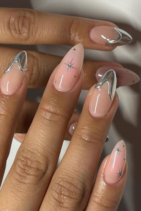 Add a touch of elegance and edge to your style with these sophisticated sheer pink stiletto nails featuring silver chrome French tips and delicate star designs. The perfect blend of chic and glam to make a fashion-forward statement. ✨ // Photo Credit: Instagram @ceesclaws Crome Nails, Silver Nail Designs, Chrome Nails Designs, Nagel Inspo, Metallic Nails, Cat Kuku, Easter Nails, Silver Nails, Prom Nails