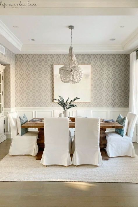 Transform your dining space into a haven of elegance with Neutral Dining Room Wallpaper Inspiration! Explore a curated collection of Dining Room Wallpaper designs, perfect for creating a captivating Dining Room Accent Wall. Dive into the world of sophisticated wallpaper ideas that extend to your kitchen, enhancing the overall aesthetic of your house dining room. Elevate your Home Decor effortlessly. Wallpaper Accent Dining Room, Dining Room Half Wall Wallpaper, Wallpaper In Dining Room With Chair Rail, Dining Room Walls Wainscoting, Neutral Dining Room Wallpaper, Wallpaper Backgrounds Dining Room, Dining Room Design With Wallpaper, Dining Room With Wainscotting And Wallpaper, Grey Floors Dining Room