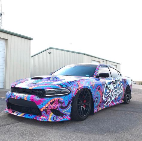 Dodge Charger SRT Hellcat painted in Go Mango and wrapped in a colorful Paisley print  Photo taken by: @caliboykev on Instagram   Owned by: @caliboykev on Instagram Aesthetic Vehicles, Jay Drawing, Hellcat Charger, Dodge Charger Srt Hellcat, Purple Jeep, Dodge Charger Hellcat, Challenger Hellcat, Dodge Chargers, Dodge Challenger Hellcat