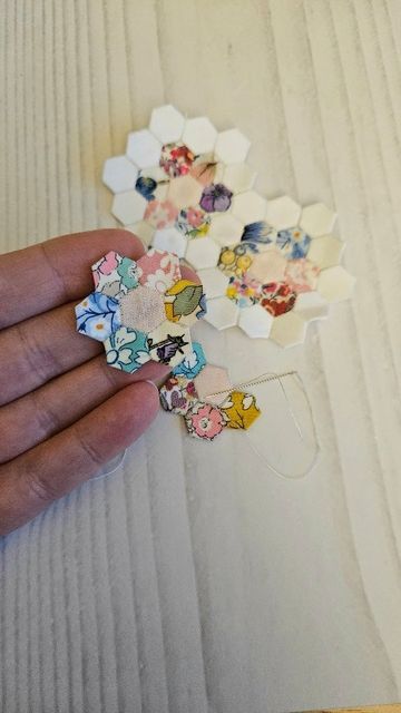 🌺ℝ𝕒𝕔𝕙𝕖𝕝 🌺 on Instagram: "Come and micro patchwork with me! These tiny quarter inch hexies are being made into a tiny grandmothers garden panel. I'm not sure how big it will be yet. it's been sitting in my fabric drawer for 2 years+ so I decided to pull it out today! I started it as a way to use up tiny @libertyquilting scraps. #epp #eppinspiration #micromini #scrappyquilt #scraphexies #scrappypatchwork #englishpaperpiecing #libertyscraps #libertyquilt" Patchwork, Micro Mini Quilts, Mini Patchwork, Liberty Quilt, Hand Sewing Projects, Fabric Drawers, Miniature Quilts, Scrap Material, Scrappy Quilt