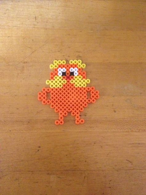 The Lorax Perler beads created by Simspon family for Read Across America Day. Thing To Make With Perler Beads, Cute Pearled Bead Ideas, Disney Hamma Beads Ideas, Things To Make Out Of Fuse Beads, Melt Bead Designs, Ideas For Melting Beads, The Lorax Perler Bead, Pealed Bead Ideas, Things To Make With Melting Beads