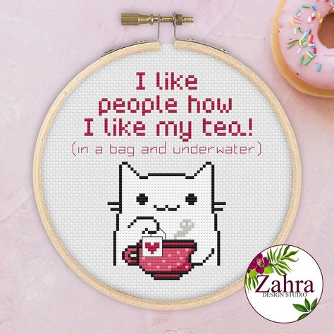 "I Like People how I Like My Tea ... In a bag underwater! Cat cross stitch pattern, cat, cat meme, ironic, sarcastic, funny, PDF pattern. Kitty cat cross stitch. Funny cross stitch pattern. Cross Stitch PDF instant download. Counted cross stitch. Kawaii Cat. Cat cross stitch pattern. Mini Cross Stitch. Sassy Cross Stitch. This is an instant download PDF, so you can start your project right away!  Pattern Keeper Compatible Chart! This chart has been tested and verified to work with Pattern Keeper by the designer. We are not affiliated with Pattern Keeper. Pattern information: - Stitches: 65 W x 72 H - Floss: DMC (6 colors) - Types of stitches: Full cross stitch and backstitch - Skill Level: Easy PDF includes: ✔️ pattern in black and white symbols ✔️ pattern in symbols on color ✔️ list of DM Amigurumi Patterns, Chat Kawaii, Funny Cross Stitch, Cross Stitch Quotes, Funny Cross Stitch Patterns, My Tea, Cat Cross Stitch Pattern, Mini Cross Stitch, Cat Cross Stitch