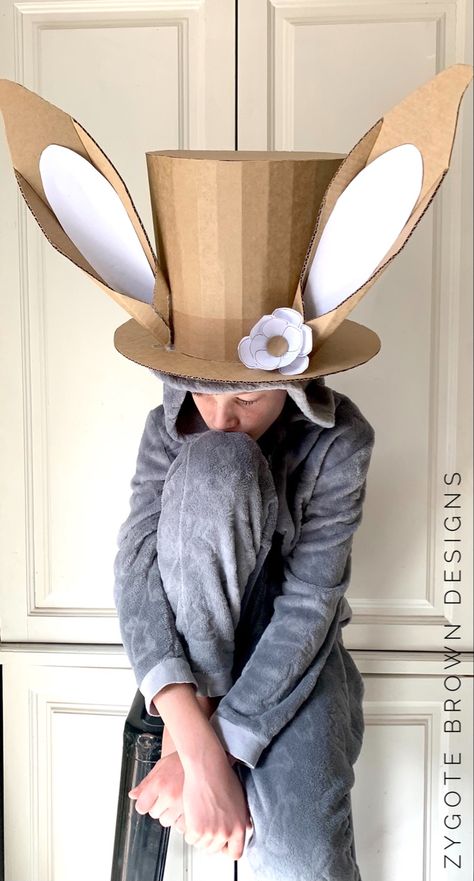 Cardboard Easter bunny top hat with ears. Top Hat With Bunny Ears, How To Make A Hat Out Of Cardboard, How To Make A Top Hat Out Of Cardboard, Bunny Easter Bonnet, Easter Top Hat, Bunny Hat Diy, Diy Easter Bonnet, Easter Parade Hats, How To Make A Top Hat