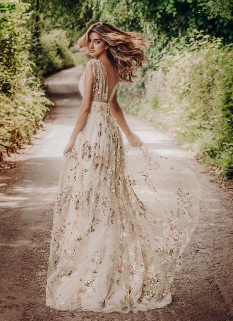 22 Casual wedding dresses for summer---woodland wedding dress with floral prints and open back, outdoor weddings, tropical weddings Pale Pink Boho Wedding Dress, Linen And Lace Wedding Dress, Rose Colored Wedding Dresses, Unique Whimsical Wedding Dress, Wedding Dress Colored Flowers, Floral Print Wedding Gown, Bohemian Floral Wedding Dress, Earthy Wedding Dress Lace, Embroidered Wedding Dress With Sleeves