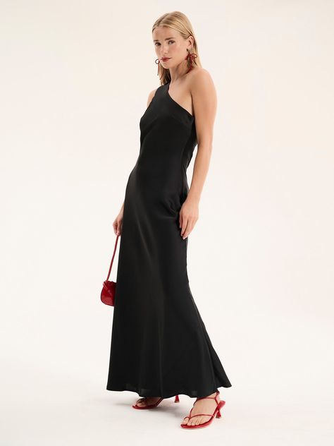 Uma is as fun as she is timeless. The asymmetric shoulder and maxi length lend her an elegance that pairs perfectly with the timeless black colour. Designed in sleek recycled poly-satin, a simple change of shoes and hair can transform this maxi dress from holiday to wedding guest in an instant. Hair, Black, Black Colour, Wedding Guest, One Shoulder Dress, Shoulder Dress, One Shoulder, Maxi Dress