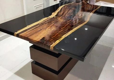 Discover the beauty of our custom epoxy table, a unique blend of nature and craftsmanship. This exquisite piece of furniture is not just a table, but a work of art that adds a touch of elegance and sophistication to any room. Each epoxy table is handcrafted with meticulous attention to detail, ensuring that no two tables are exactly alike. The live edge table design encapsulates the raw beauty of nature, making it a conversation starter in your living room or dining area. Our epoxy coffee table and dining table are made from carefully selected wood, preserved in its natural state and enhanced with a glossy epoxy resin finish. The epoxy table top is incredibly durable and resistant to scratches, making it perfect for everyday use. The blend of natural wood and shimmering epoxy creates a stu Black Epoxy Table, Resin Wood Table, Counter Top Decor, Luxury Office Furniture, Wooden Bar Table, Epoxy Dining Table, Acacia Wood Table, Table Home Decor, Wood Furniture Legs