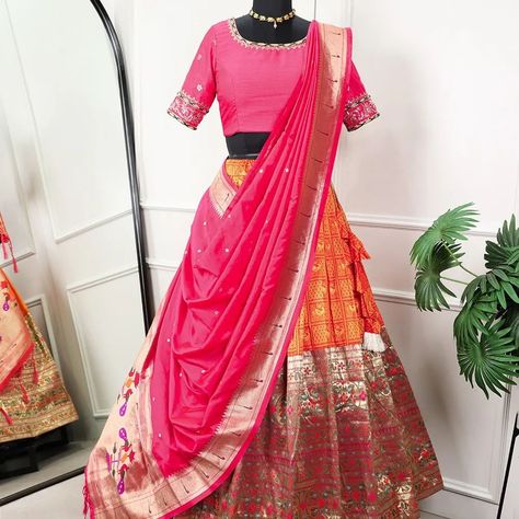 *🌷Paithani Collection🌷* A jacquard orange lehenga and handwork blouse with a beautiful Jacquard silk paithani dupatta giving all your special occasions! *Lehenga(Stitched)* Lehenga Fabric : Jacquard (Paithani) Lehenga work : Zari Weaving Work Waist : SUPPORTED UP TO 42 Length : 41 Flair : 3.50 Meter Stitching : Stitched With Canvas and Can Can Lehenga Closer : Drawstring with *Handmade Tassels* Inner : Micro Cotton *Blouse(Unstitched)* Blouse Fabric : Banglory Blouse Work : Handwork Bl... Half Saree Onam, Paithani Half Saree, Kerala Half Saree, Half Sleeve Blouse Designs, Langa Voni Half Saree, Paithani Lehenga, Jacquard Lehenga, Pink Half Sarees, Silk Half Saree