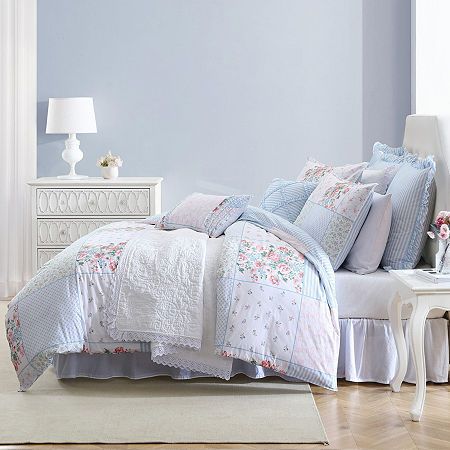 Introducing the Laura Ashley hope bonus comforter set - a delightful fusion of timeless charm and comfort. Elevate your home decor with this exquisite ensemble that combines a printed patchwork design with an array of floral and stripe sections in soothing shades of pink, green, and blue. Immerse yourself in the luxury of this 100% cotton set that effortlessly blends style and coziness. The centerpiece of this set is the generously sized comforter, adorned with a meticulously crafted patchwork … Patchwork, Pink And Blue Comforter, Green Blue Pink Bedroom, Pink And Blue Room Decor, Blue And Pink Room Aesthetic, Pink And Blue Girls Bedroom, Blue And Pink Bedding, Shabby Chic Dorm Room, Sorority House Rooms