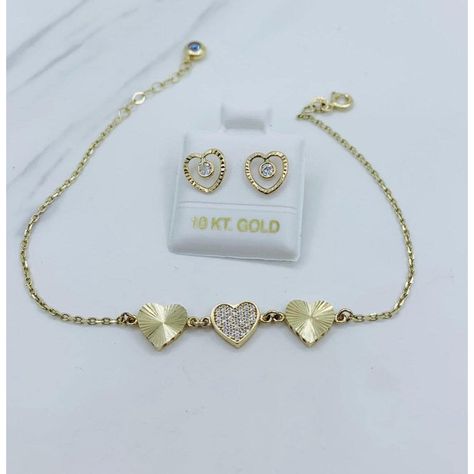 ❤️ 10k gold bracelet and earring hearts set  ❤️ Dainty gold bracelet 7" long with a 1" extension, making it an 8" if needed  ❤️ Stud heart earrings screwback  ❤️ 100% 10 karat gold  ❤️ Great for Sweet 15 or 16 gift  ❤️ Middle heart with white cubic zirconia  Checkout my other jewelry  ❤️ Brasalete corazones de oro de 10 kilates set  ❤️ Aretes de Corazones de tornillo  ❤️ Pulsera con corazón delgadita mide 7 pulgadas de larga con una extensión de 1 pulgada ❤️ Pulsera Oro dorado con piedra Blanca