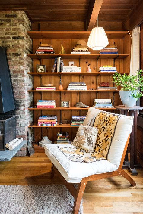 Drop the Paint Brush: Wood Paneling is Officially Cool Again — Rooms That Get It Right Wood Panel Library Room, Cottage With Wood Paneling, Brick And Paneling Wall, White Wood Paneling Living Room, Home Decor Wood Paneling, Dark Painted Wood Paneling, Basement Wood Paneling Ideas, Wood Panel Walls Decor, Wood Paneling Painted White