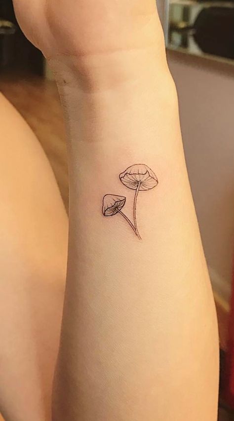 Discreet And Charming Wrist Tattoos You'll Want To Have #wristtattoos #tattooinspo #classytattoos #elegance Patchwork, Stick And Poke Mushroom Tattoo, Wrist Mushroom Tattoo, Tattoo Mushroom Small, Flash Mushroom Tattoo, Small Tattoo Mushroom, Mushroom Anklet Tattoo, Realism Mushroom Tattoo, Minimalist Tattoo Mushroom