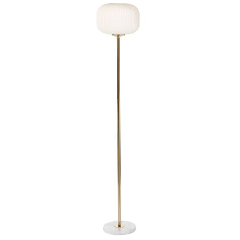 "CosmoLiving by Cosmopolitan White Metal Floor Lamp Add soft, ambient light to your entryway, living room, or bedroom with this cool and modern white orb floor lamp. The frosted white glass shade is a rounded square shape with ribbing and bulb that is inserted within the white plastic housing that secures your glass shade. This glowing orb is perched on a long metallic gold iron stem that conceals your cord, which flows out of the white and gray marble base, complete with a foot switch for your convenience. Uses standard E26 bulb (not included). This item has a 72” cord length. Suitable for indoor use only. Convenient foot switch on cord for easy on/off function. Marble is a product of nature and no two pieces are exactly alike, it is prone to variations in color and/or patterns in the mat Globe Floor Lamp, Orb Light, Unique Floor Lamps, Metal Floor Lamp, Cosmoliving By Cosmopolitan, Tall Lamps, Torchiere Floor Lamp, White Floor Lamp, Marble And Gold