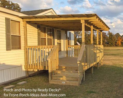 http://www.mobilehomerepairtips.com/mobilehomeroofingoptions.php has some information on the types of roofing available for your mobile home. Terrasse Mobil Home, Mobile Home Improvements, Mobile Home Porches, Mobile Home Deck, Manufactured Home Porch, Porch Ideas For Mobile Homes, Mobile Home Renovations, Porch Designs, Double Staircase