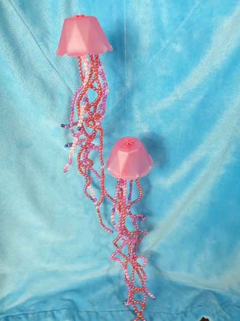 Pink meanie jellyfish made from plastic ice cream cups, beads, wire and fishing line. Cream, Fishing, Jellyfish, Beads, Ice Cream Cups, Ice Cream Cup, Fishing Line, 1960s, Ice Cream