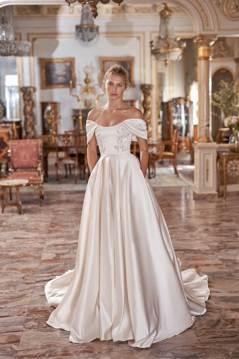 Champagne Wedding Dress Satin, Royal Elegant Wedding Dress, Satin Wedding Dress With Mesh Sleeves, Bridgestone Wedding Dress, Love Story Inspired Wedding Dress, Square Neck Off The Shoulder Wedding Dress, Rounded Neckline Wedding Dress, Princess Diana Inspired Wedding Dress, Fold Over Top Wedding Dress