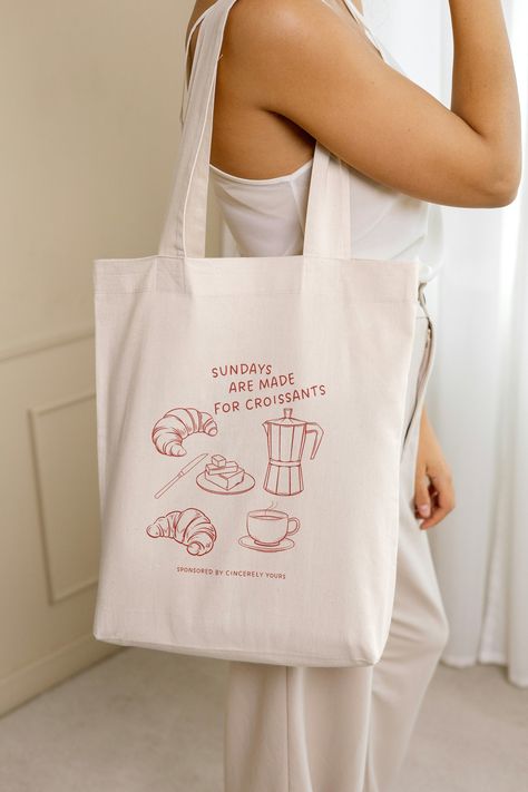 Sundays are made for croissants tote bag breakfast lover gift sustainable bag Y2K aesthetic funny meme wellness girl coffee 90s old money ♡ 100% Cotton ♡One size ♡ Multiple color options ♡ Cross stitching on handles 90s Old Money, Bakery Merch, Wellness Girl, Coffee Tote Bag, Aesthetic Funny, Bag Y2k, Breakfast Lovers, Sustainable Bag, Eco Bag