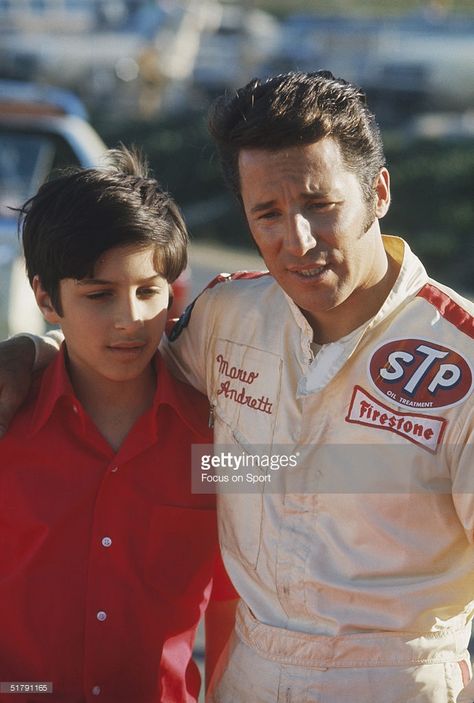 Race car driver Mario Andretti poses with his son Michael Andretti. 1970 Kingdom Living, F1 Retro, Indy Car Racing, Chassis Fabrication, Race Car Driver, Mario Andretti, Indycar Series, Course Automobile, Classic Racing Cars