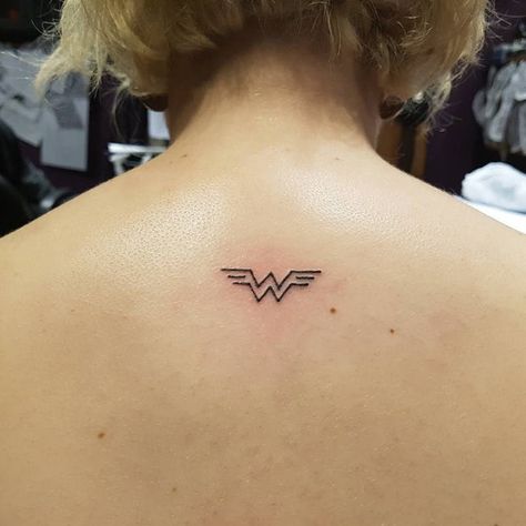 Love the simplicity of this tiny Wonder Woman tattoo. Wonder Woman Tattoo, Hero Tattoo, Woman Tattoo, Tattoo Small, Sleeve Tattoos For Women, Foot Tattoo, Trendy Tattoos, Foot Tattoos, Tattoos For Women Small