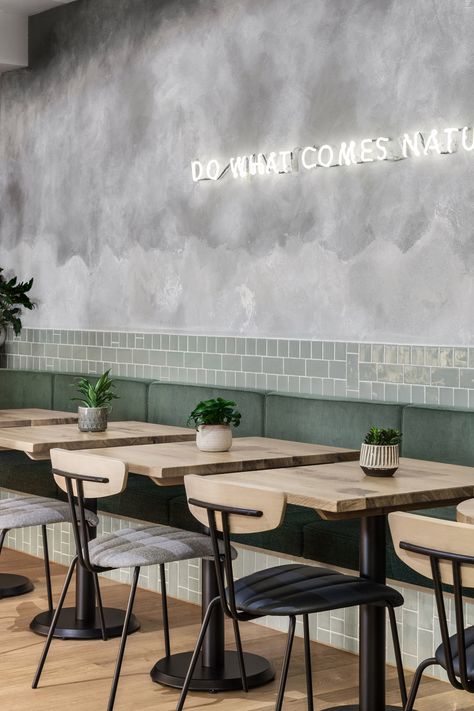 Farmer J restaurant in London boasts grey surfaces and green accents Café Design, Restaurant In London, Neon Signage, Decoration Restaurant, Decoration Vitrine, Design Café, Concrete Walls, Coffee Shops Interior, 카페 인테리어 디자인