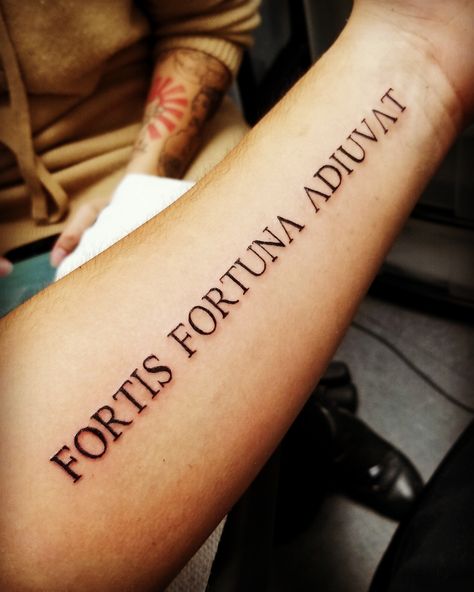 My first tattoo. Fortune favors the bold. Bold Font Tattoo Words, Fortune Favours The Bold Tattoo, Bold Tattoo Fonts For Men, Latin Font Tattoo, Small First Tattoo Ideas For Men, Fortis Fortuna Adiuvat Tattoo Font, Audentis Fortuna Iuvat Tattoo, Roman Quotes Tattoos, Fortis Fortuna Adiuvat Tattoo Arm