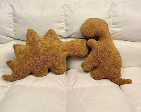 🌟 Introducing The Adorable Handmade Dinosaur Nugget Pillows! 🦕 🎉 Get ready to add a splash of prehistoric fun to your space with these super cute, handcrafted pillows! Perfect for dinosaur lovers of all ages, they're not just cozy - they're a statement piece! 🌈 🦖📏 Large Nugget Dimensions: #A (Stegosaurus): 60x33 cm (23.6x13 inches) 300g #B (Tyrannosaurus): 53x40 cm (20.9x15.7 inches) 270g #C (Brontosaurus): 60x48 cm (23.6x18.9 inches) 280g #D (Amargasaurus): 50x33 cm (19.7x13 inches) 140g Weighted Dinosaur, Dinosaur Theme Party Decorations, Dino Chicken Nuggets, Dinosaur Chicken Nuggets, Chicken Pillows, Donut Pillow, Chicken Nugget, Dinosaur Theme Party, Flower Throw Pillows