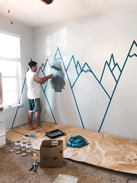 Diy Geometric Mountain Mural, Mountain Wall Art Kids Rooms, Tape Mountains Wall Art, Mountain Playroom Ideas, Playroom Mural Mountains, Easy Nursery Mural Ideas, Playroom Mountain Wall, Playroom Mountain Mural, Easy Mountain Mural For Nursery