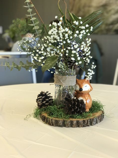 Woodland themed centerpiece Woodland Party Table Decor, Woodlands Theme Centerpieces, Wilderness Table Decorations, Woodland Animals Shower Theme, Christmas Baby Shower Table Centerpieces, Centerpieces Woodland Theme, Woodland Themed Table Decorations, Woodland Baby Shower Theme Flowers, Woodsy Floral Arrangements Rustic Centerpieces