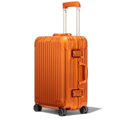 Aluminium Suitcase, Orange Suitcase, Orange Luggage, Lightweight Carry On Luggage, Rimowa Luggage, Hand Luggage Bag, Cabin Suitcase, Best Carry On Luggage, Stylish Luggage