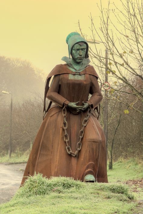The Statue of Alice Nutter - Alice Nutter of Roughlee, one of twelve witches marched in chains from the Pendle area to Lancaster. One of eleven tried at Lancaster Casle and one of ten hanged. The crime: Witchcraft ~ Photo by...Gerry© Pendle Witch Trials, Minions, English Witchcraft, Pendle Witches, Famous Witches, Pendle Hill, Witch History, Which Witch, Salem Witch Trials