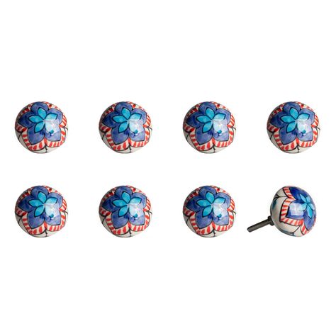 Cheerful and refreshing, our unique vintage knobs are a great addition to any room. Beautifully hand painted by skilled artisans, the bright colors and antique charm add a bohemian flair and traditional touch. With bolts that can be trimmed to size, our knobs are useful in a variety of applications, including cabinets, drawers, doors, cupboards and more. Dress up your furniture without breaking the bank! Features: Hand painted with antique charm No additional hardware required 1.5 in. diameter 1 inch bolt can be trimmed to size Easy Installation - Insert the knob bolt through the hole on the front of the cabinet/drawer/door with one hand. Screw the accompanying knob nut over the bolt from the back. Make the first few turns with your fingers, then switch to a wrench. Tighten the screw with Taj Hotel, Home Decor Classic, Classic Cabinet, Vintage Knobs, Cabinets Drawers, Blue Orange White, Decorative Knobs, Rustic Doors, Motif Vintage